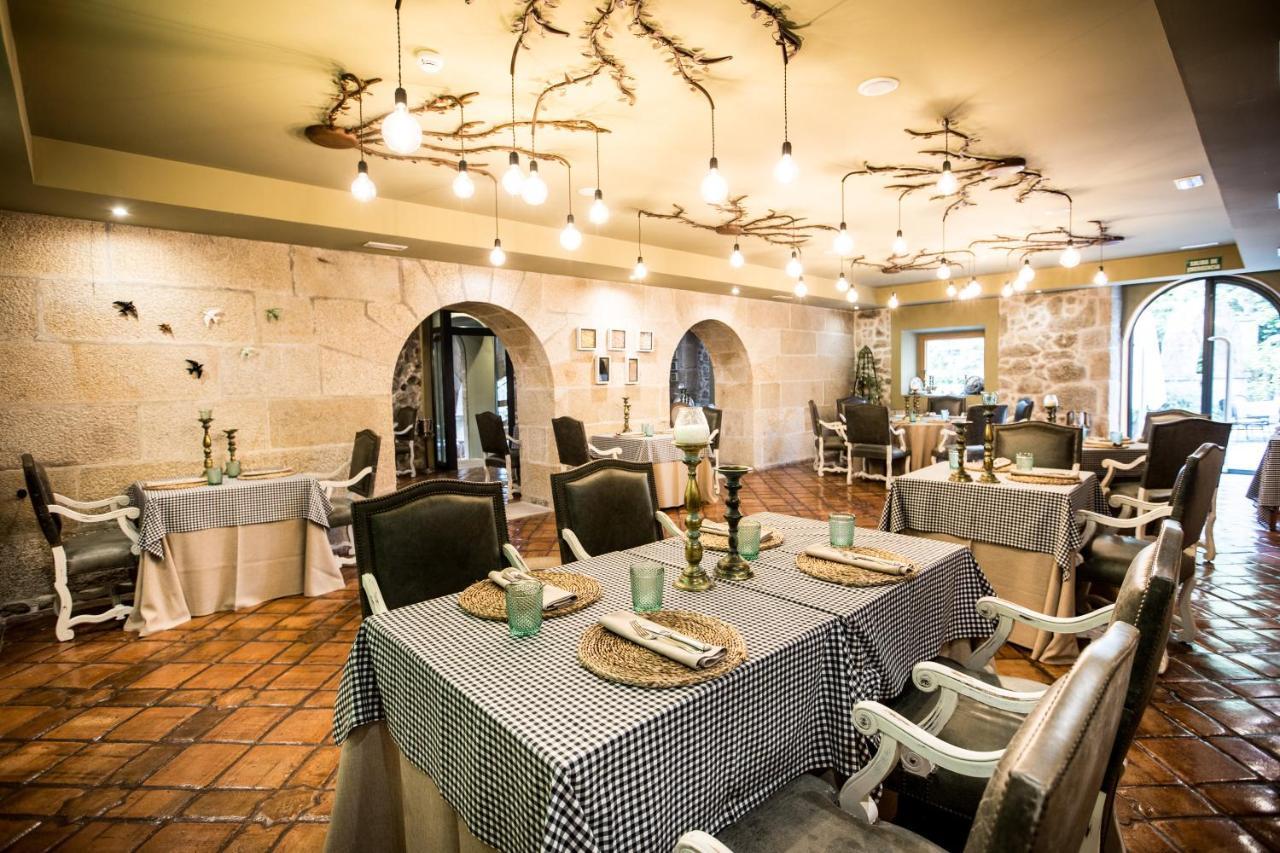 埃斯库德酒店 spa及海滩 比戈 外观 照片 Restaurant in the hotel
